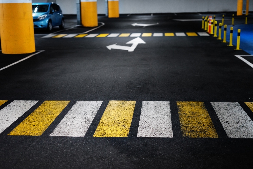 Parking lot line striping